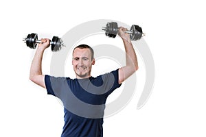 Close up of young man lifting weights