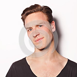 Close up of a young man on white background