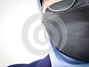 Close up young muslim business woman wearing protective face mask.