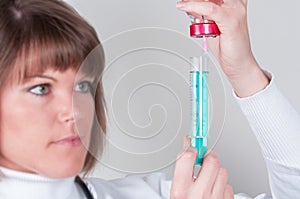 Nurse preparing injektion isolated on white photo