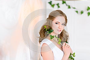 Close-up of young pretty woman. Female studio portrait. Health and beauty concept. Look to the camera.