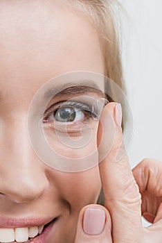 close up of young smiling woman