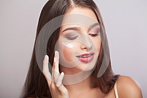 Close-up of a Young Woman Getting Spa Treatment. Cosmetic Cream
