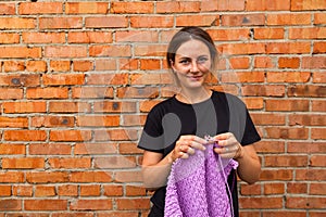 Close-up Young woman knitting