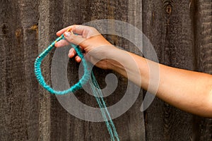 Close-up Young woman knitting