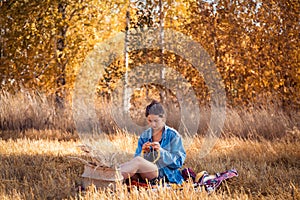 Close-up of a young woman knitting