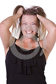 Close up of young woman pulling her hairs