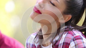 Close-up of young woman singing