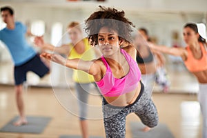 Close up of young woman on stretching training indoor