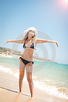 Close-up of a young woman with sunglasses sunlight