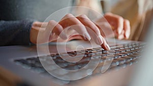 Close-up of young woman using laptop