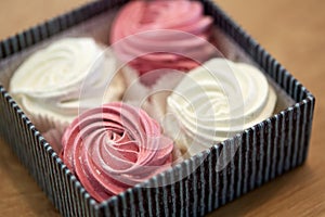 Close up of zephyr or marshmallows in gift box