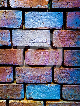 Close up zoom of brick wall in red and blue color