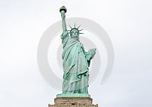 Close Upa View of Statue of Liberty. Lady Liberty Enlightening the World. Colossal Neoclassical Sculpture on Liberty Island, NYC