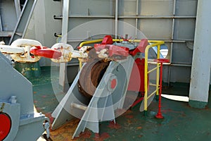 Close view on anchor roller chain stopper for hawse pipe on the forward mooring station of container vessel.