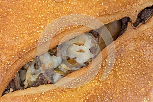 Close view of a baked steak stromboli