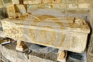 Canon`s tomb located in the cloister of the Sainte-Marie Cathedral of Saint-Bertrand-de-Comminges