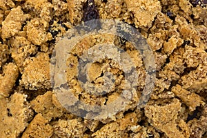 Close view of crumbled oatmeal raisin cookies