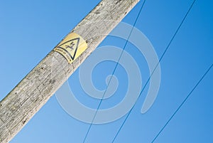 Close view of Danger sign on electricity pole