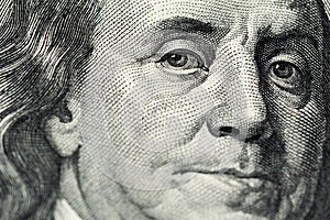A close view of engraving portrait of Ben Franklin of old one hundred us dollars banknote