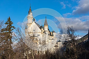 Close view of famous Neuschwanstein Castle in the afternoon sunshine before sunset in winter, Schwangau, Bavaria, Germany