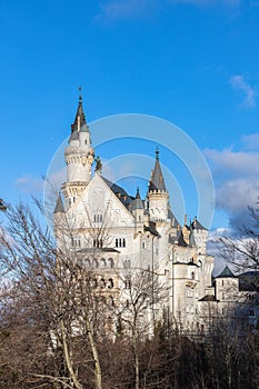 Close view of famous Neuschwanstein Castle in the afternoon sunshine before sunset in winter, Schwangau, Bavaria, Germany