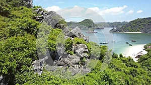 Close View Girl Climbs down Dangerous Rocks against Ocean Bay