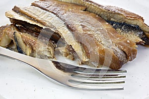 Close view herring fillets on plate