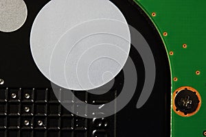 CLOSE VIEW OF AN INTERNAL COMPUTER HARD DRIVE