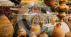 Close View Of Jugs In Shop Flea Market Of Antiques Old Retro Vintage Things. A Lot Of Old Things. Used Things. Second