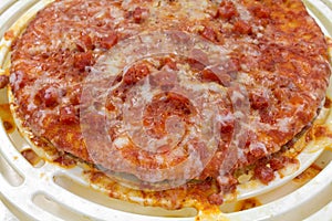 Close view of microwaved pizza