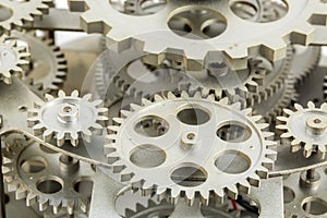 Close view of old clock mechanism with gears and cogs.