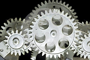 Close view of old clock mechanism with gears and cogs.