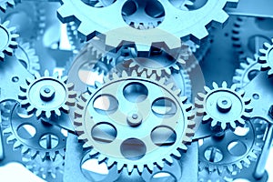 Close view of old clock mechanism with gears and cogs.