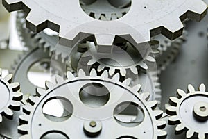 Close view of old clock mechanism with gears and cogs.