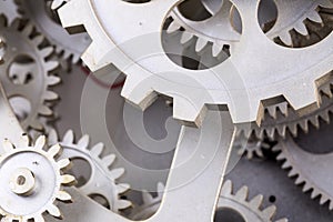 Close view of old clock mechanism with gears and cogs. Conceptual photo for your successful business design.