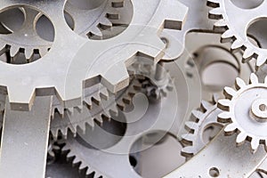 Close view of old clock mechanism with gears and cogs. Conceptual photo for your successful business design.