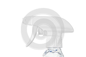 Close view of a plastic spray bottle`s head for dispersion isolated on a white background