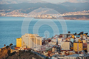 Close view of the Recinto neighborhood in Ceuta and the bay of Morocco in the background at sunrise photo