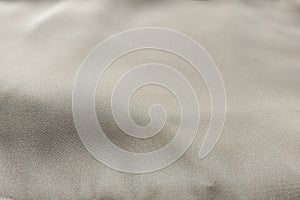 Close view of light beige rayon fabric photo