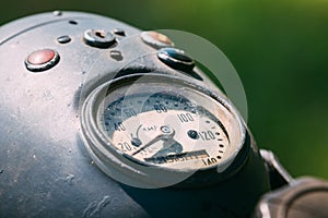 Close View Of Speedometer At Mechanical Dashboard Of Old Rarity Gray Motorbike