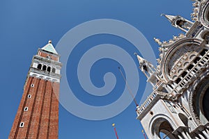 Close view of St Mark`s Campanile and Palazzo Ducale at Piazzetta San Marco in Venice, Italy