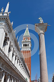 Close view of St Mark`s Campanile and Palazzo Ducale at Piazzetta San Marco in Venice, Italy