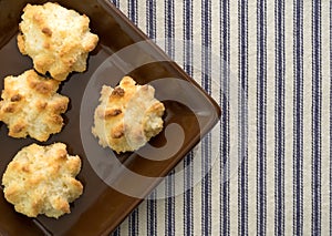 Close view of sugar free coconut macaroons on small plate