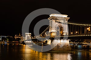 Close view of the Szechenyi Chain Bridge over the River Danube at night in Budapest, Hungary