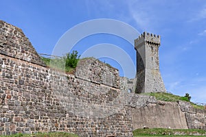 Close view to the brick walls of Radicofani construction and Tower, Tuscany, Italy