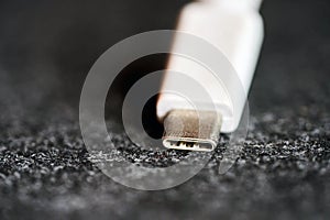 Close view of a white USB-C connector