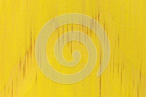 Close view of a yellow painted pine board