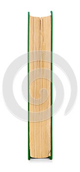 Closed book in green cover to the side