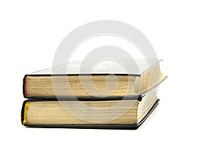 Closed books on the table .. Bible. On a white background. Stack of books